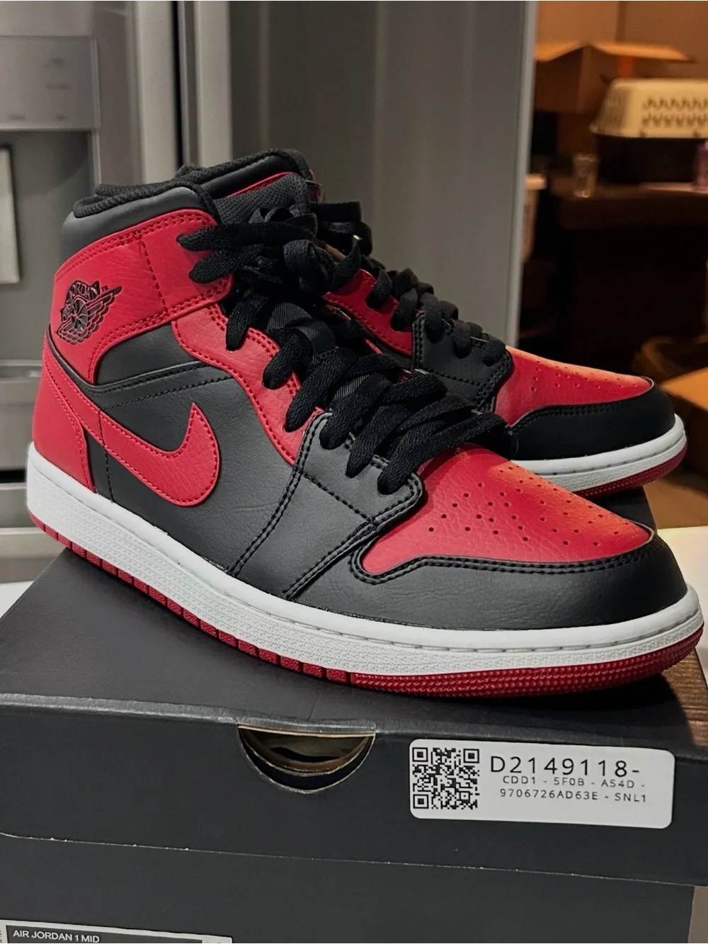 Nike Air Jordan 1 Mid Black and Red Sneakers